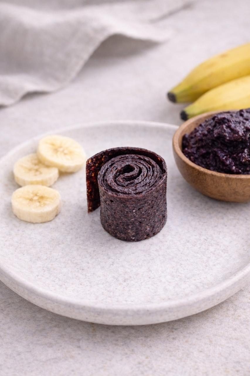 Docinho de açaí com banana, enrolado à mão